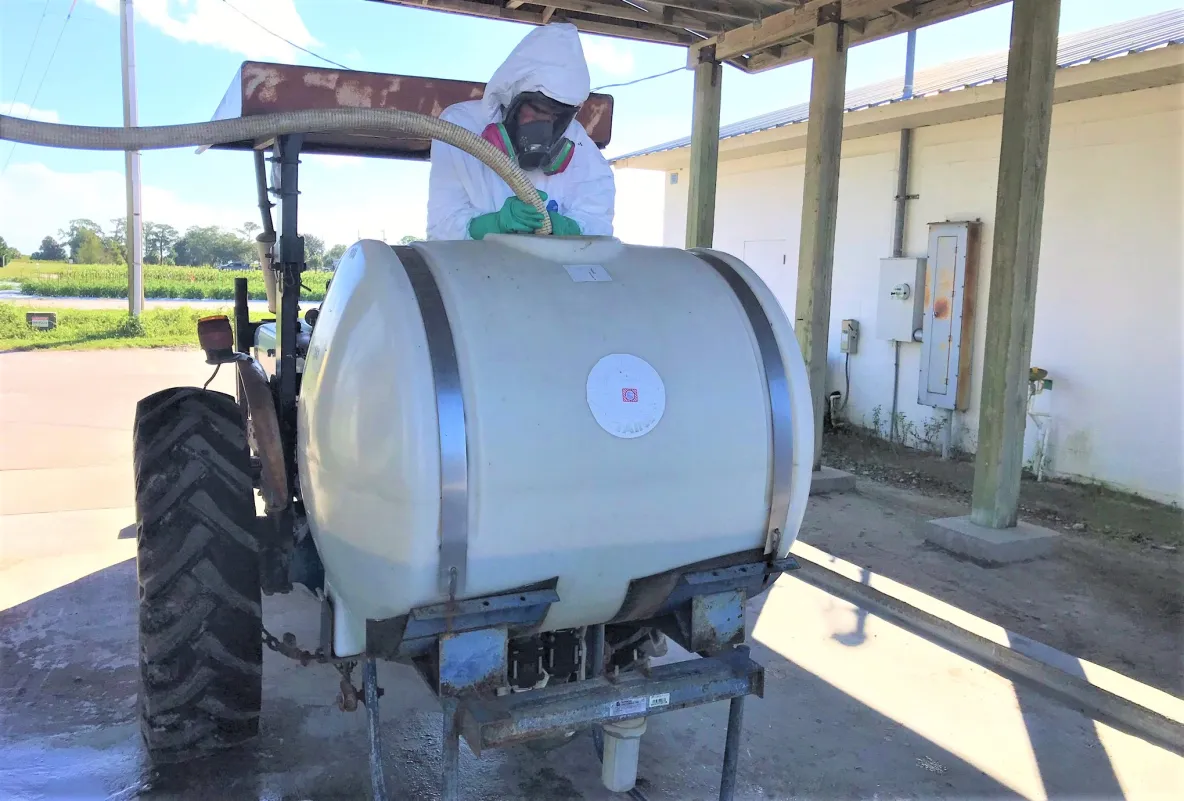 Picture 1 adding water before tank mixing of herbicides.webp